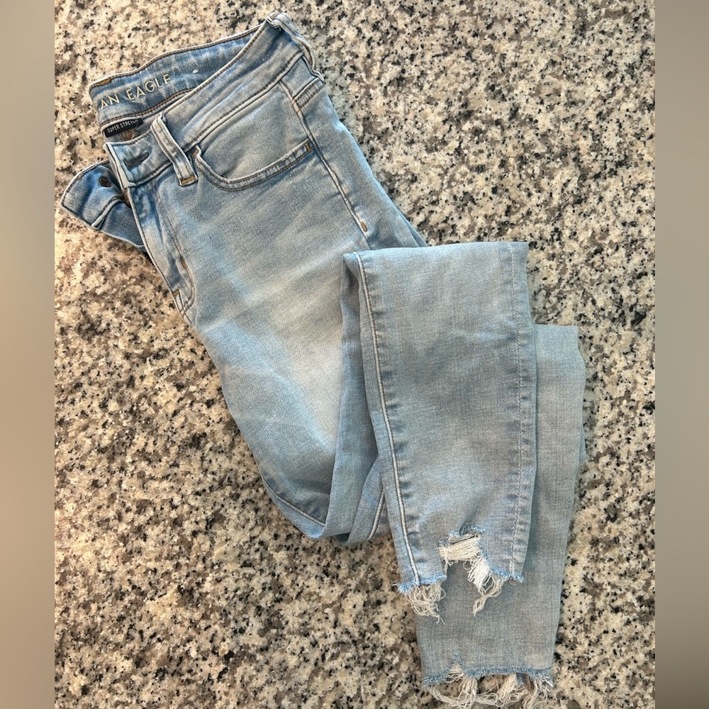 American eagle light wash super skinny stretchy jeans.